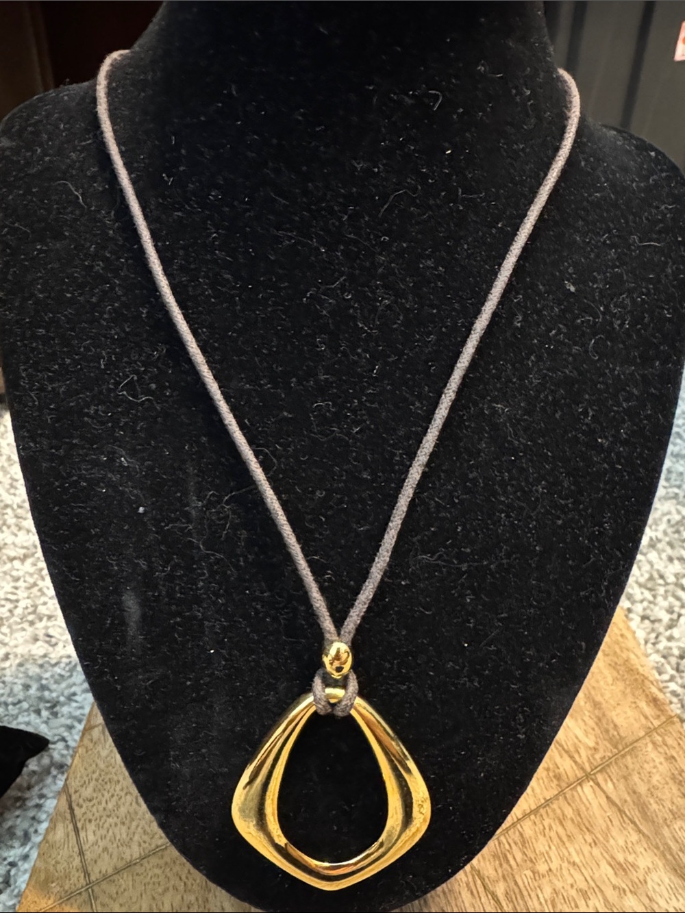 Lia Sophia Gold Teardrop Pendant on Brown Cord